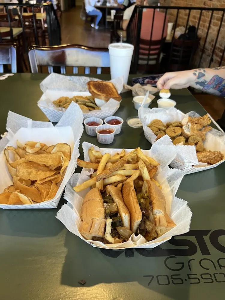 Philly Steak Sandwich and Fried Pickles